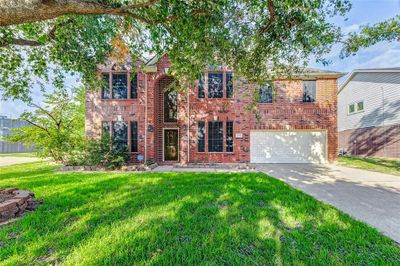 The property features a spaciousand inviting interior, complementedby a wide driveway that adds bothconvenience and curb appeal. | Image 3