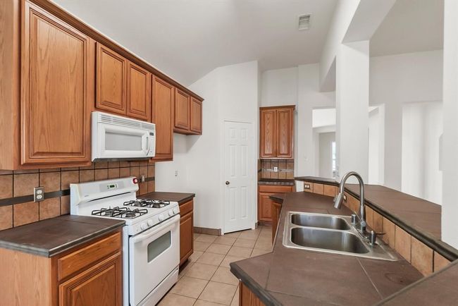 19311 Twin Buttes Dr, House other with 4 bedrooms, 2 bathrooms and 2 parking in Tomball TX | Image 20