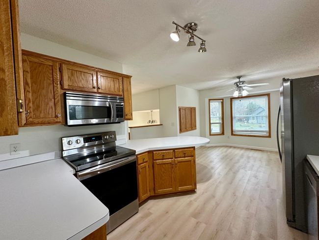 14210 Tungsten St Nw, House other with 3 bedrooms, 2 bathrooms and null parking in Ramsey MN | Image 11