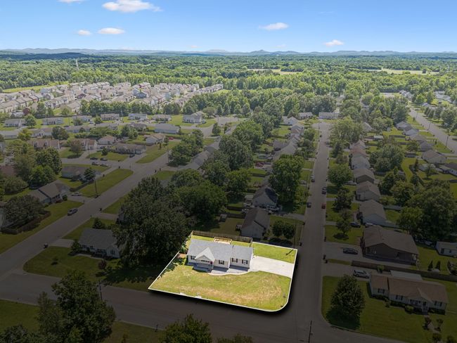 With mature trees dotting the landscape, the ambiance is both serene and picturesque! 2095 Bolden Drive, Murfreesboro, TN 37127 | Image 26