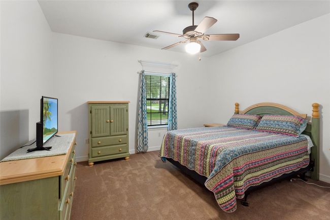 Secondary bedrooms are all large with walk in closets. | Image 22