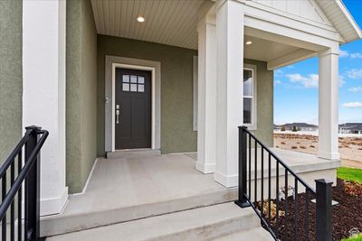 Entrance to property featuring covered porch | Image 3