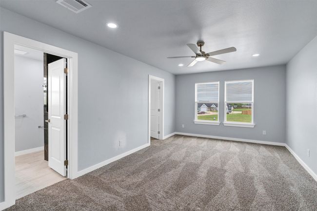 Unfurnished room with carpet floors, a ceiling fan, and recessed lighting | Image 25