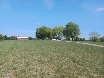 View of yard with a rural view | Image 1