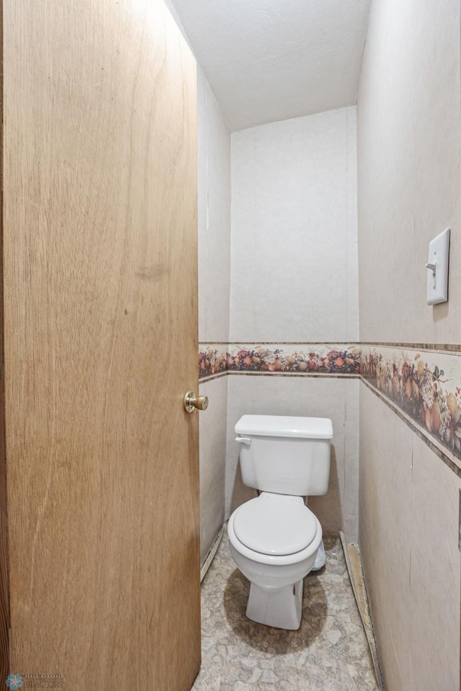 Toilet on main floor | Image 15