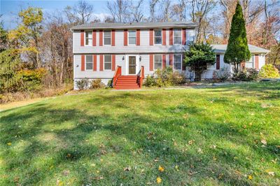 Colonial house featuring a front lawn | Image 2