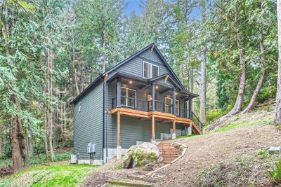 Beautiful New Construction, never lived in home with mature trees on over 1 acre lot. | Image 1