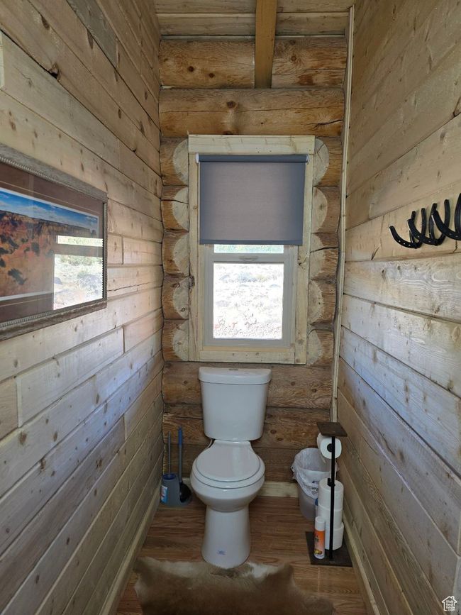 Bathroom with toilet and wood finished floors | Image 81