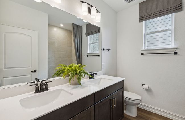 Stylish secondary bath with high-end fixtures *Model representation | Image 21