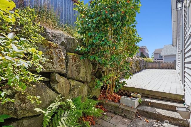 Tidy and manageable backyard with composite deck | Image 29