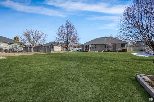 View of yard featuring fence | Image 29