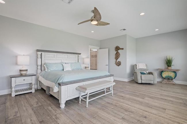 The primary suite is tastefully furnished, and includes a king size Sleep Number bed | Image 29