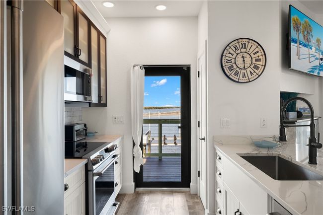 4706 Pine Island Rd Nw, House other with 2 bedrooms, 2 bathrooms and null parking in MATLACHA FL | Image 9