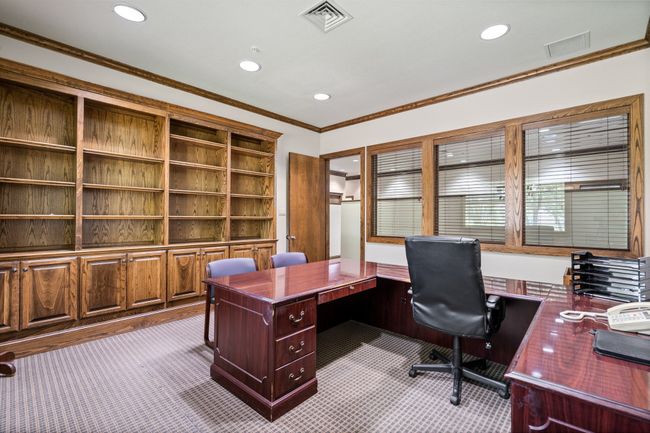 Carpeted office featuring recessed lighting and ornamental molding | Image 10