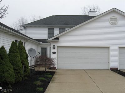 View of front property featuring cooling unit and a garage | Image 1