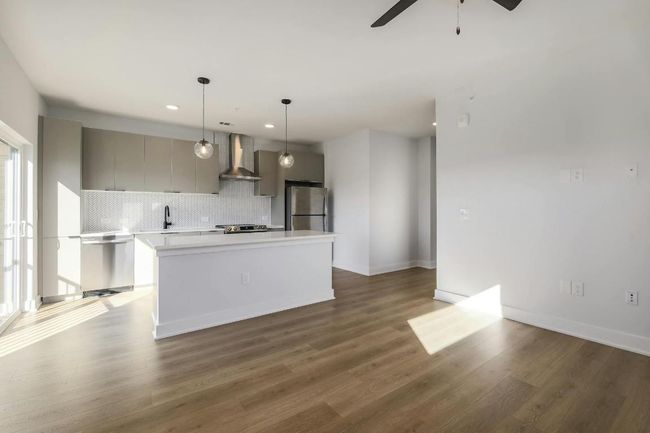 Open floor plan - kitchen and living room view | Image 8