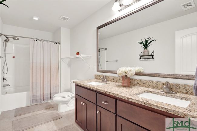 Bathroom # 2 with double sinks, granite countertops and tub/shower combo | Image 32