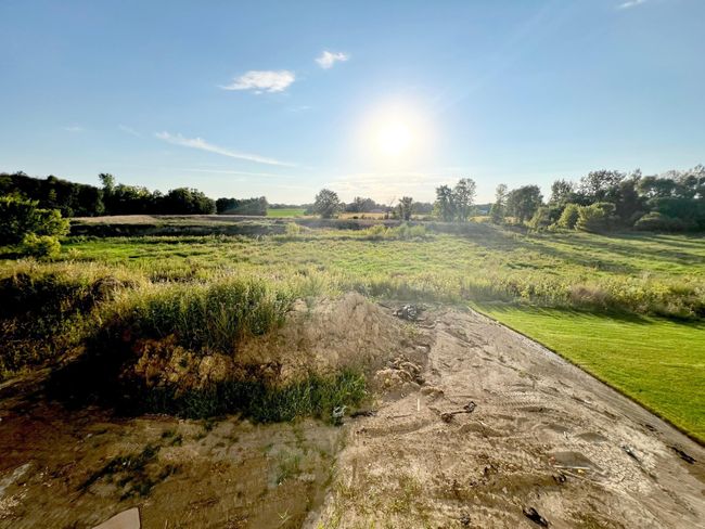 Home sits on a gorgeous, secluded 0.76 acre lot that backs to protected wetlands. | Image 40