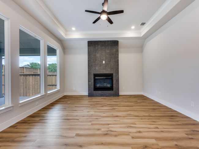 You'll find a stunning fireplace in the family room where family memories are sure to be made! | Image 10