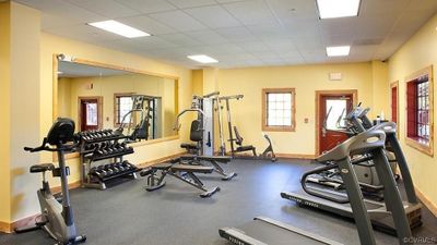 Exercise room featuring a paneled ceiling | Image 2