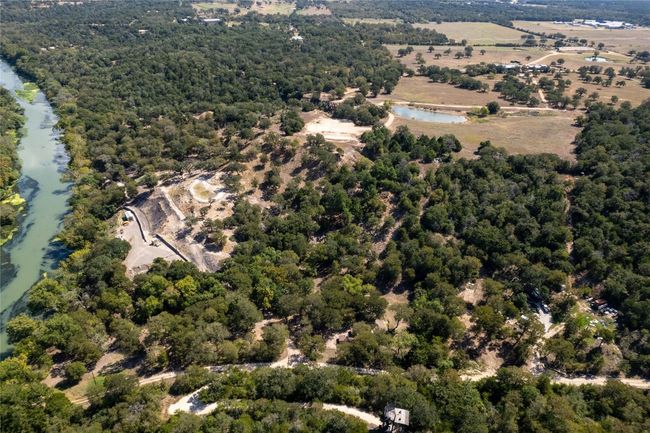Corner property. Surrounding areas. Aerial showing topography. | Image 22