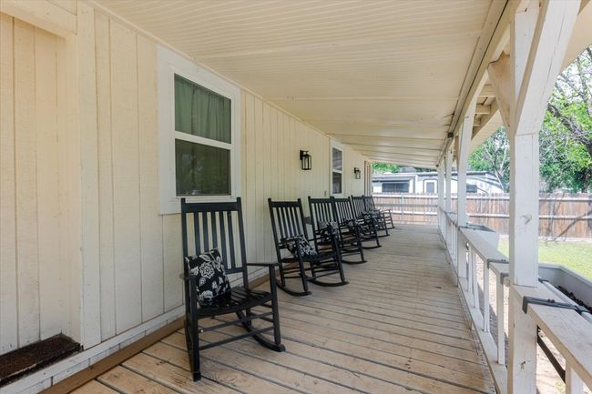 A front porch made for relaxing - Manufactured Home | Image 11