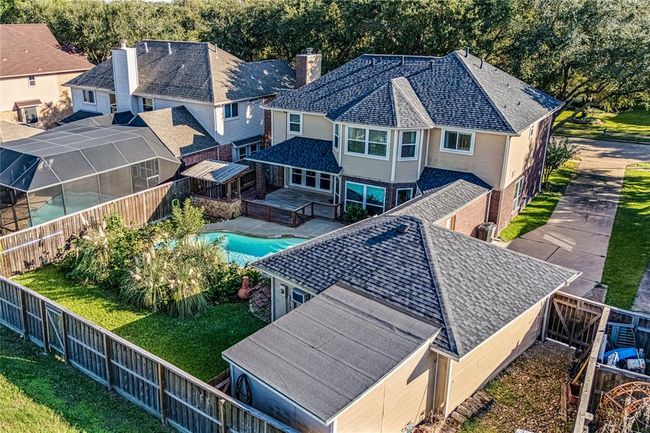 A brand new roof was installed on the home and garage in May of 2024. It has 5 years of warranty remaining that is transferrable to the next homeowner. | Image 44