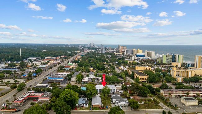 View of urban area featuring a nearby body of water | Image 25