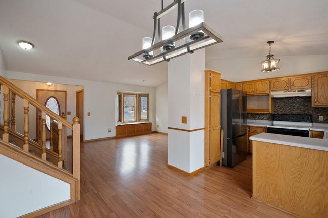 livingroom and kitchen area | Image 6