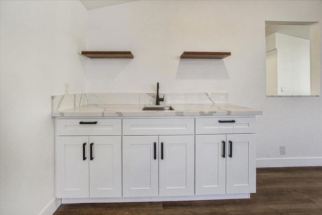 custom wetbar in living area | Image 20