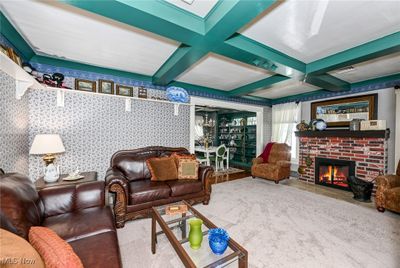 Formal Living room with woodburning fireplace. | Image 3