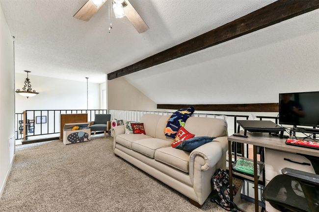This cozy loft / game room is perfect for studying or just kicking back and watching TV. | Image 25