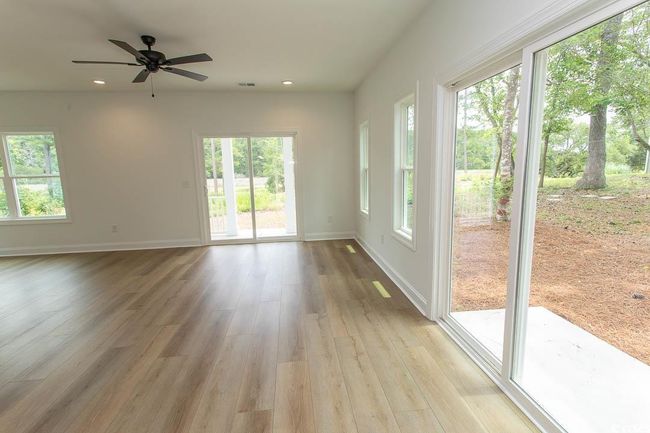 Eating Area featuring healthy amount of natural light, light wood-style flooring, recessed lighting, and baseboards | Image 7