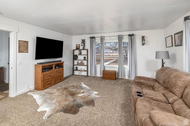 View of carpeted living room | Image 7