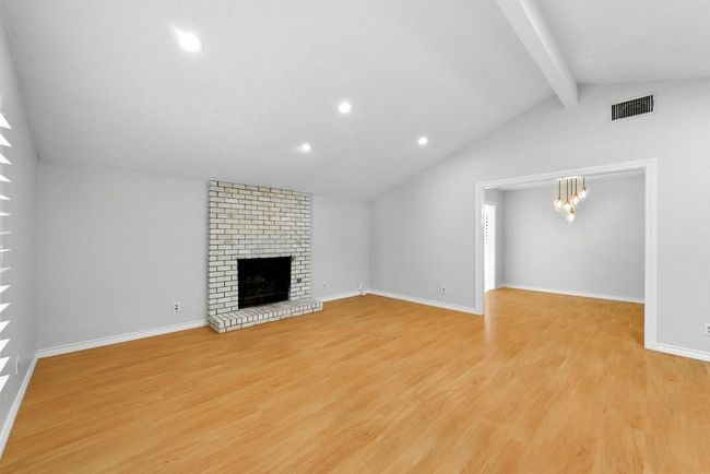 Living room with view of Dining room | Image 7