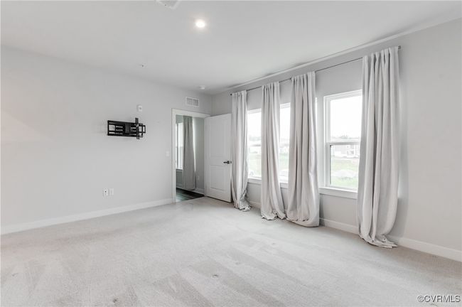 Empty room featuring light colored carpet | Image 26