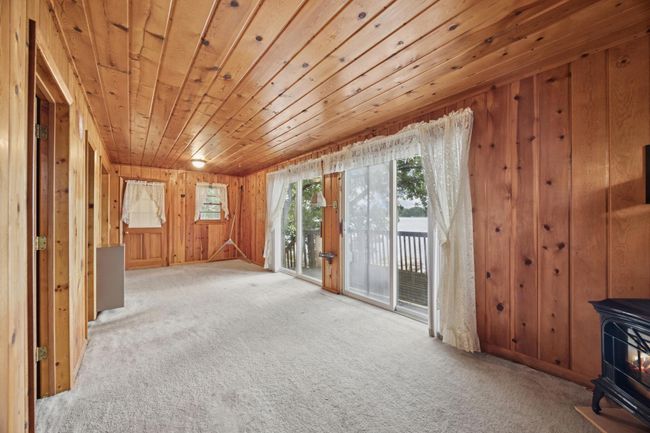 open living room and dining room with dula slider doors on to the deck! | Image 6