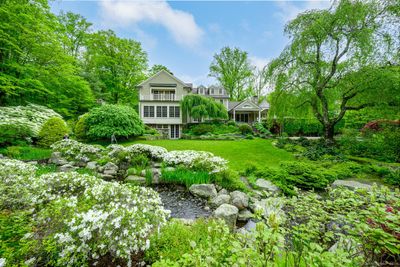 Delightful in all seasons; peaceful and welcoming 4.14 acres. | Image 3