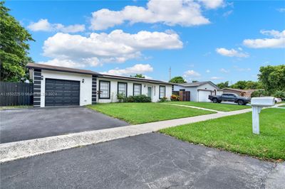 8030 Nw 44th Ct, House other with 3 bedrooms, 2 bathrooms and null parking in Lauderhill FL | Image 2