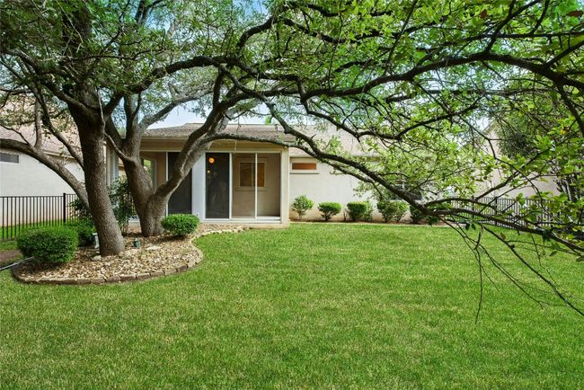 Rear view of property with stucco siding | Image 25