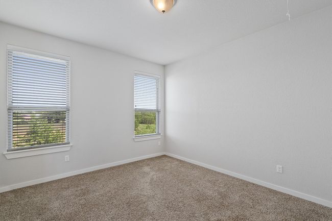 Spare room with carpet floors and baseboards | Image 31