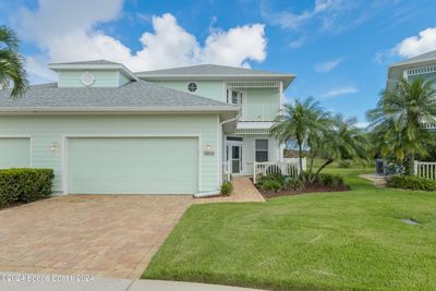 1068 Eleuthera Drive Ne, Townhouse with 3 bedrooms, 2 bathrooms and null parking in Palm Bay FL | Image 1