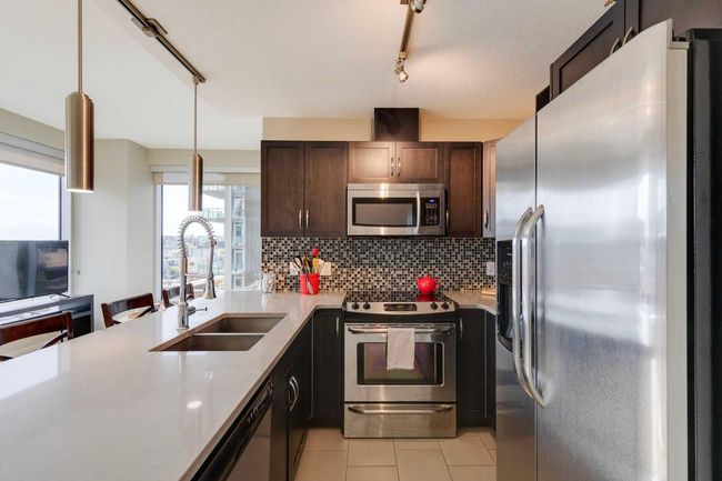 402 - 1320 1 St Se, Condo with 2 bedrooms, 2 bathrooms and 1 parking in Calgary AB | Image 4