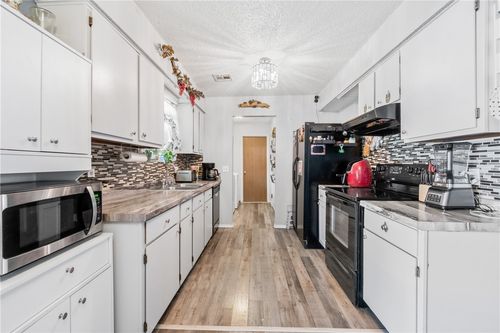 410 Homewood Pl, Lowell, AR, 72745-9566 | Card Image