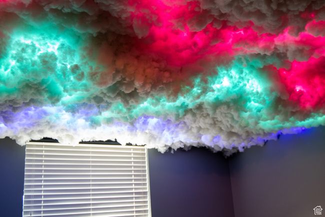 Kids play area or mood room featuring new LVP flooring and baseboards, adjustable mood lighting on the ceiling | Image 23