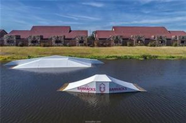 View of car parking with a water view | Image 31