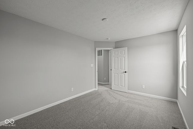 unfurnished room with baseboards, carpet floors, and a textured ceiling | Image 16