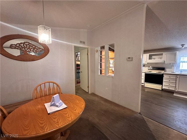Dining area featuring visible vents | Image 18