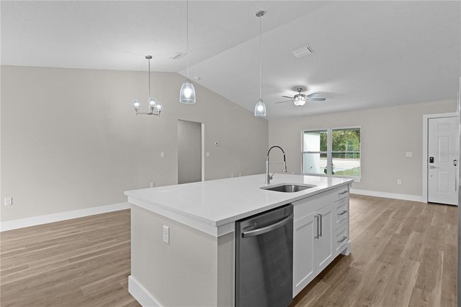 From the kitchen looking towards dining and living areas | Image 7