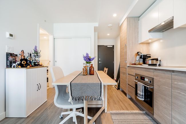 Dining room with recessed lighting and light wood-type flooring | Image 10